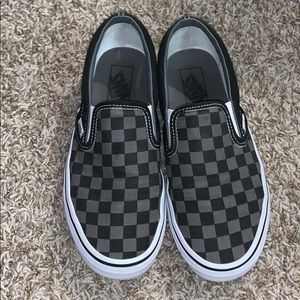 Black and grey checkered Vans